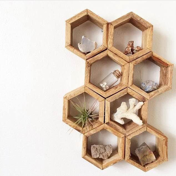 Made from old cedar wood someone tore out of a home on my street, these honeycomb shelves are perfect for any rock collector, airplant enthusiast, or just someone with a knack for knick-knacks. Each individual hexagon is 2.75" in diameter.